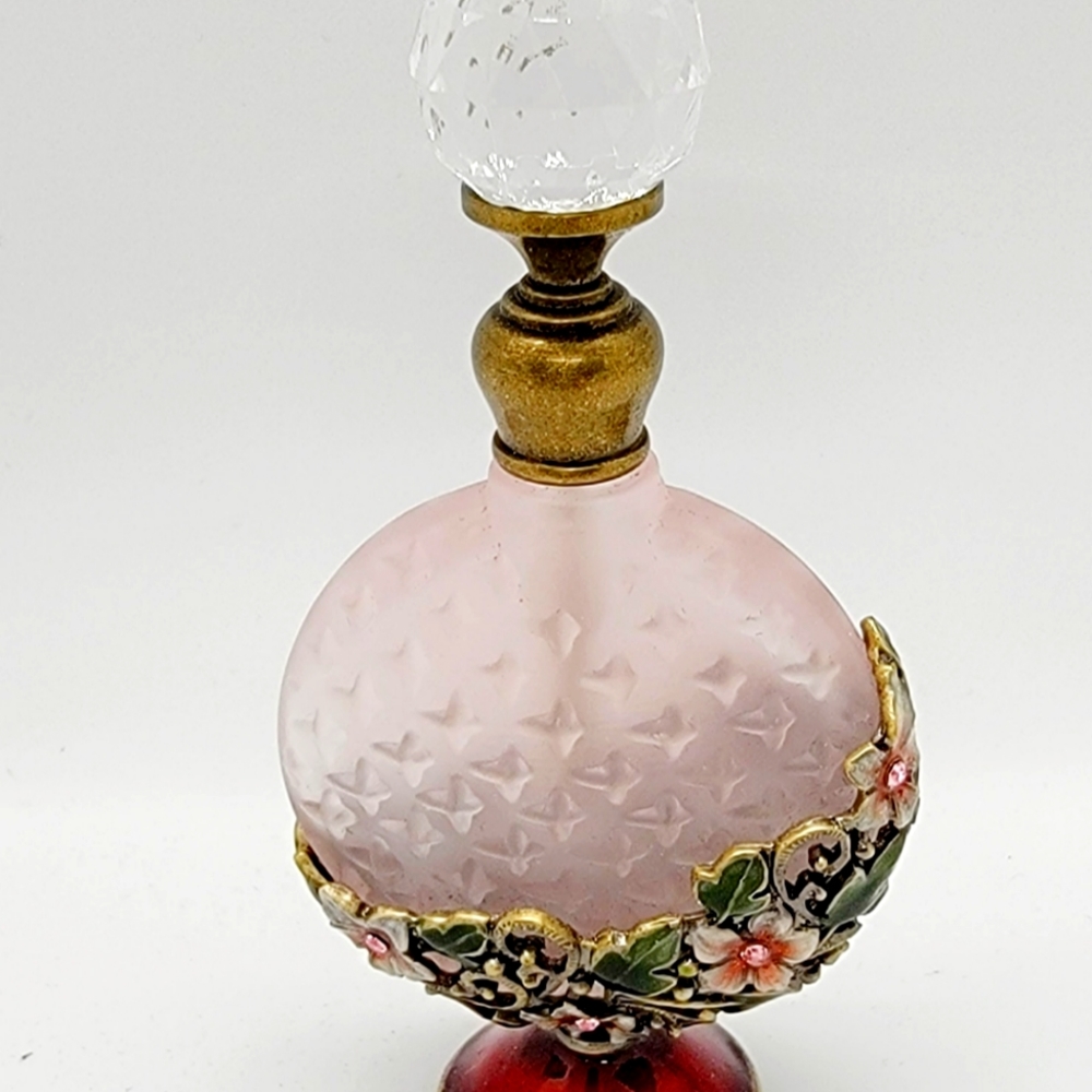 Decorative perfume bottle with crystals